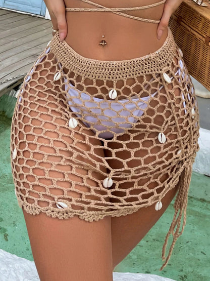 Jupe courte  faite main avec coquillages.