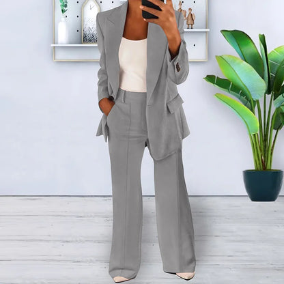 Ensemble deux pièces pour femme : veste blazer, pantalon de travail à jambes larges et taille haute élastique.