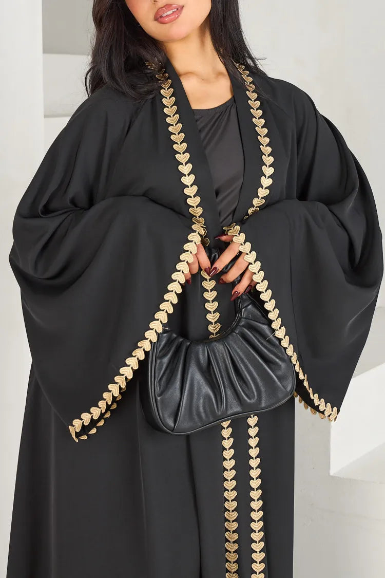 Abaya cardigan pudique pour femme.