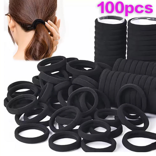 Lot de 100 élastiques à cheveux noirs.