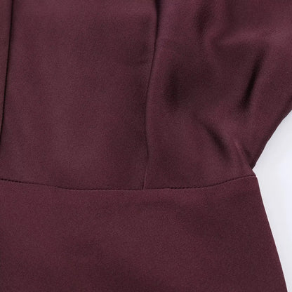 Robe longue élégante unie à col en V et manches longues, Collection printemps 2026. Coupe chic et ajustée.