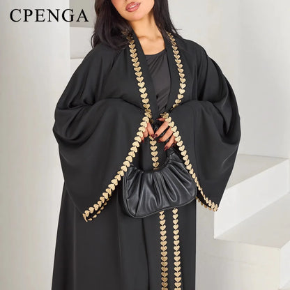 Abaya cardigan pudique pour femme.